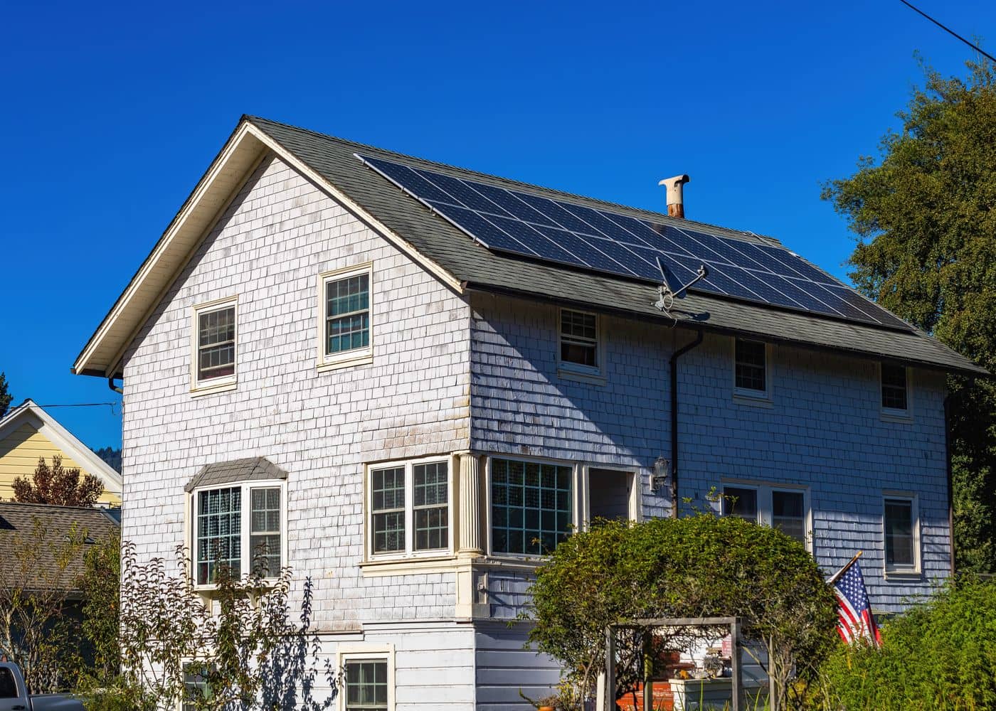 Modern home with rooftop solar panels